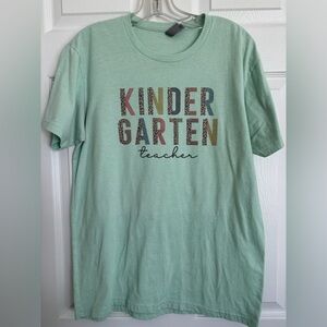 Size medium teal Next Level brand Kindergarten leopard print tshirt